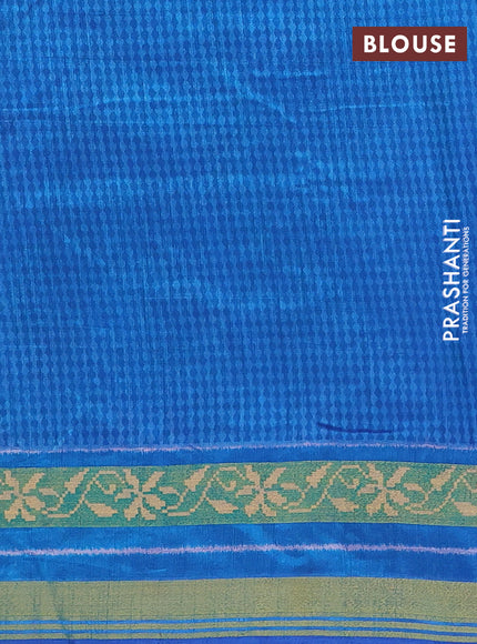 Semi tussar saree bottle green and blue with allover ikat prints and ikat woven zari border