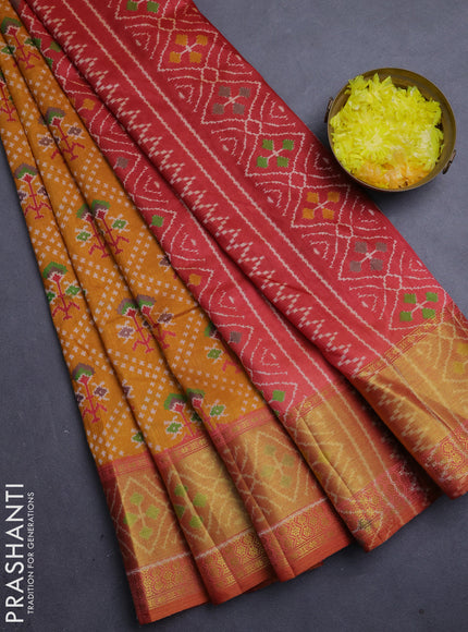 Semi tussar saree mustard yellow and rustic orange with allover leheriya style ikat weaves and ikat woven zari border