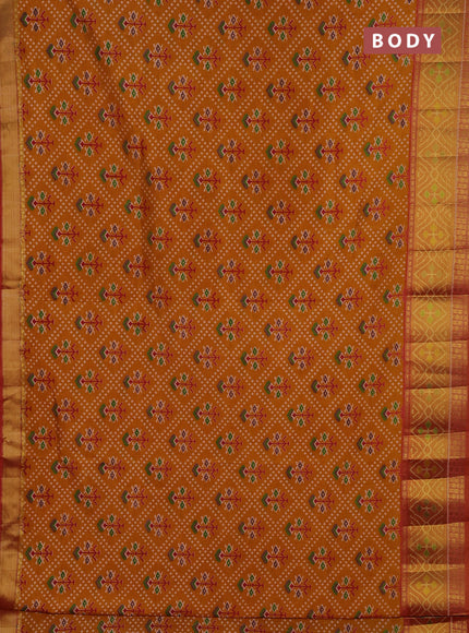 Semi tussar saree mustard yellow and rustic orange with allover leheriya style ikat weaves and ikat woven zari border