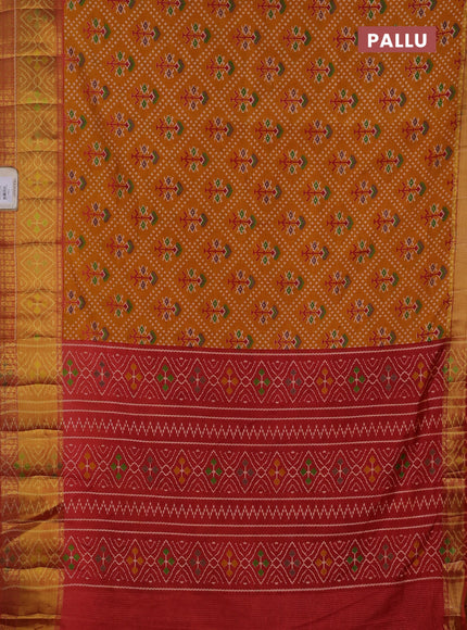 Semi tussar saree mustard yellow and rustic orange with allover leheriya style ikat weaves and ikat woven zari border