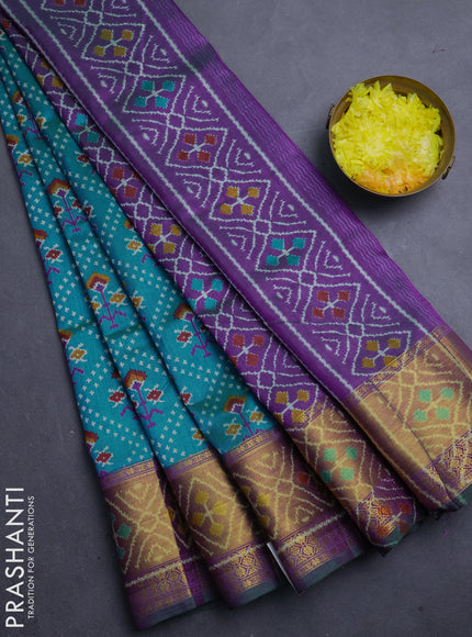 Semi tussar saree dual shade of bluish green and purple with allover leheriya style ikat weaves and ikat woven zari border