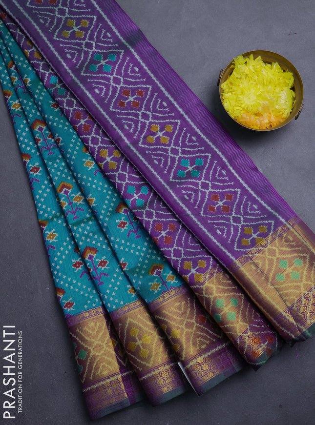 Semi tussar saree dual shade of bluish green and purple with allover leheriya style ikat weaves and ikat woven zari border