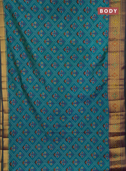 Semi tussar saree dual shade of bluish green and purple with allover leheriya style ikat weaves and ikat woven zari border