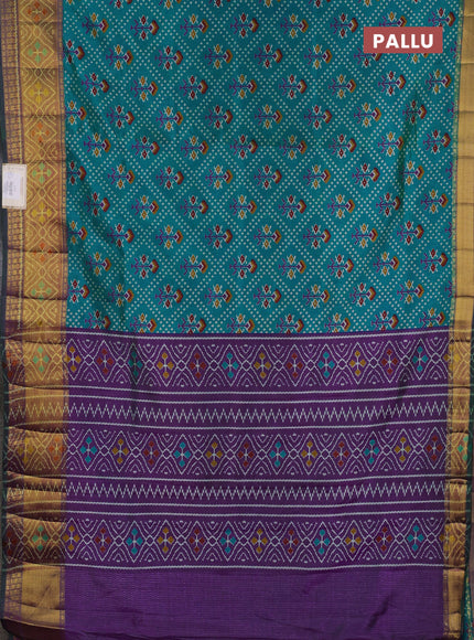 Semi tussar saree dual shade of bluish green and purple with allover leheriya style ikat weaves and ikat woven zari border