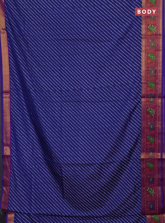 Semi tussar saree indigo blue and purple with allover leheriya style ikat weaves and ikat woven zari border