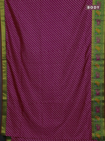 Semi tussar saree dark pink and green with allover leheriya style ikat weaves and ikat woven zari border