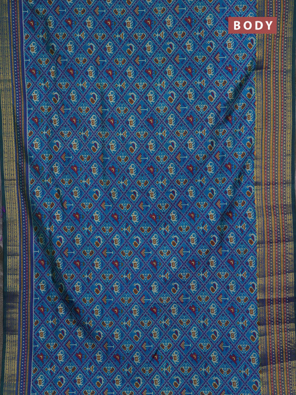 Semi tussar saree dual shade of bluish green and green with allover patola prints and ikat woven zari border