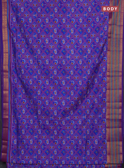 Semi tussar saree blue with allover patola prints and ikat woven zari border