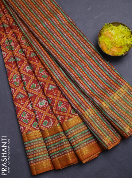Semi tussar saree maroon and dark mustard with allover patola prints and ikat woven zari border