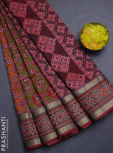 Semi tussar saree mehendi green and maroon with allover ikat prints and ikat woven zari border