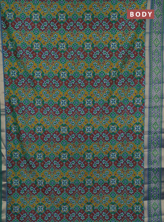 Semi tussar saree light green with allover ikat prints and ikat woven zari border