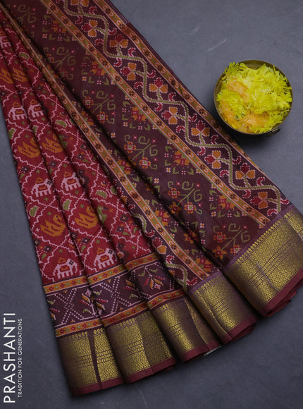 Semi tussar saree maroon with allover patola prints and zari woven border
