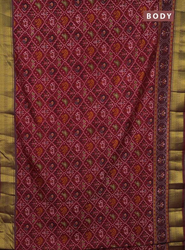 Semi tussar saree maroon with allover patola prints and zari woven border