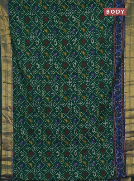 Semi tussar saree green and blue with allover patola prints and zari woven border