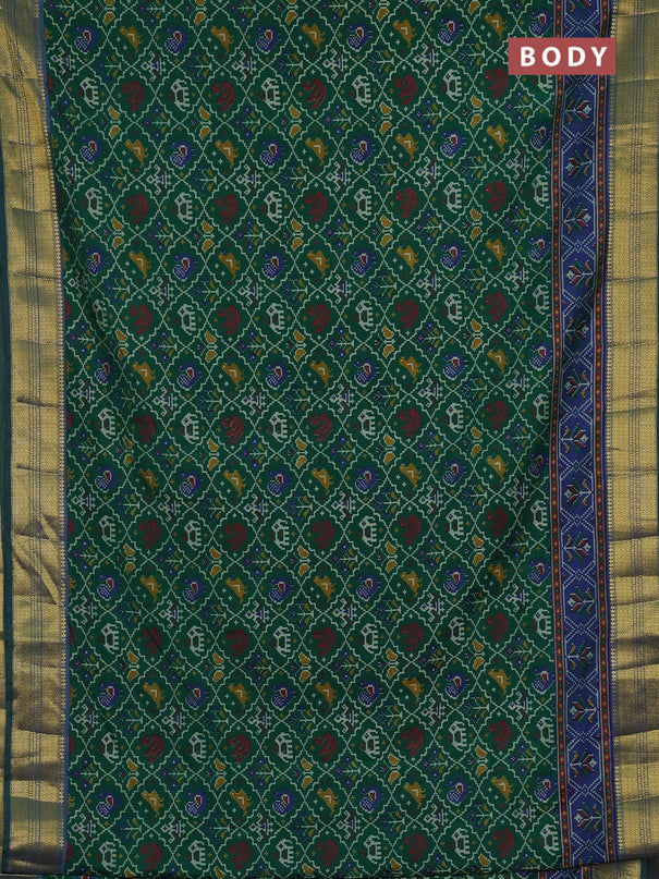 Semi tussar saree green and blue with allover patola prints and zari woven border