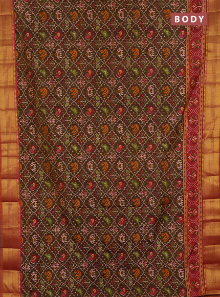 Semi tussar saree mehendi green and rust shade with allover patola prints and zari woven border