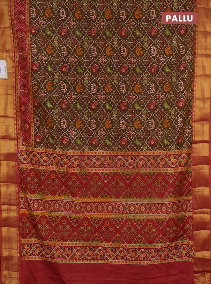 Semi tussar saree mehendi green and rust shade with allover patola prints and zari woven border