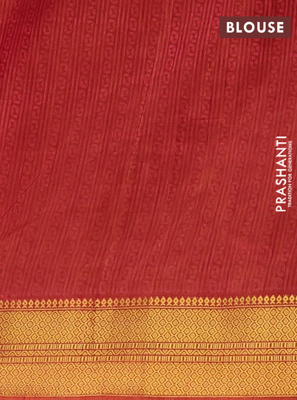 Semi tussar saree mehendi green and rust shade with allover patola prints and zari woven border