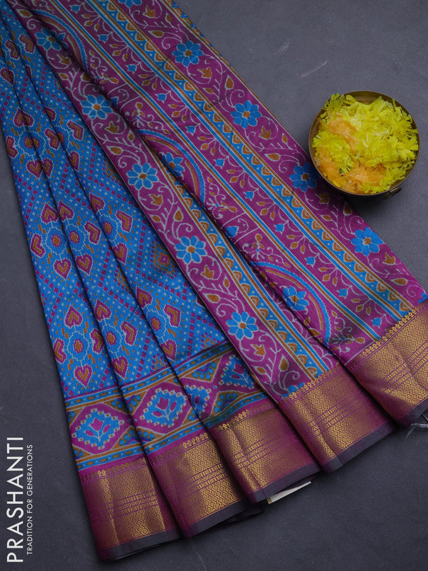 Semi tussar saree dual shade of bluish green and green with allover ikat prints and zari woven border
