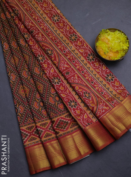 Semi tussar saree mehendi green and rust shade with allover ikat prints and zari woven border