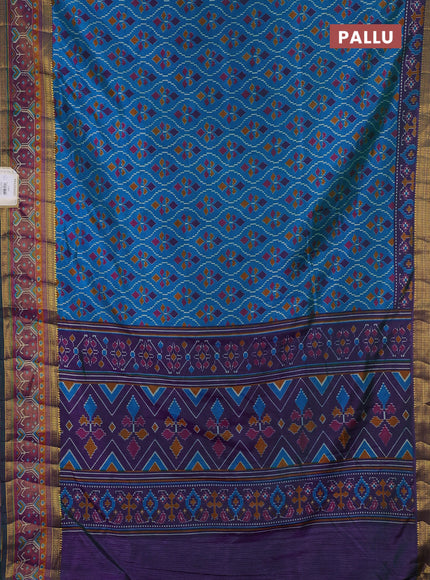 Semi tussar saree dual shade of bluish green and purple with allover ikat prints and ikat woven zari border