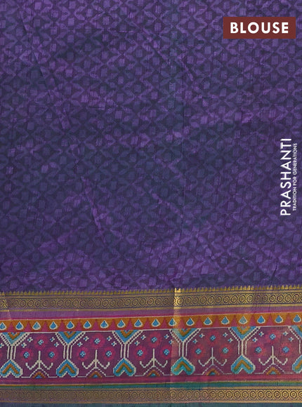 Semi tussar saree dual shade of bluish green and purple with allover ikat prints and ikat woven zari border