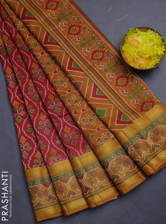 Semi tussar saree maroon and mustard yellow with allover ikat prints and ikat woven zari border