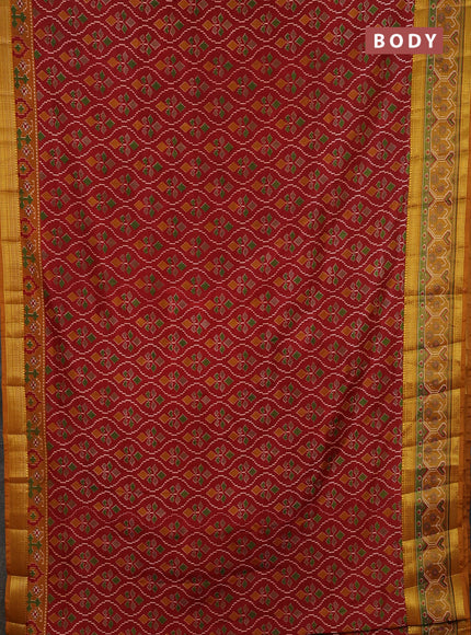 Semi tussar saree maroon and mustard yellow with allover ikat prints and ikat woven zari border