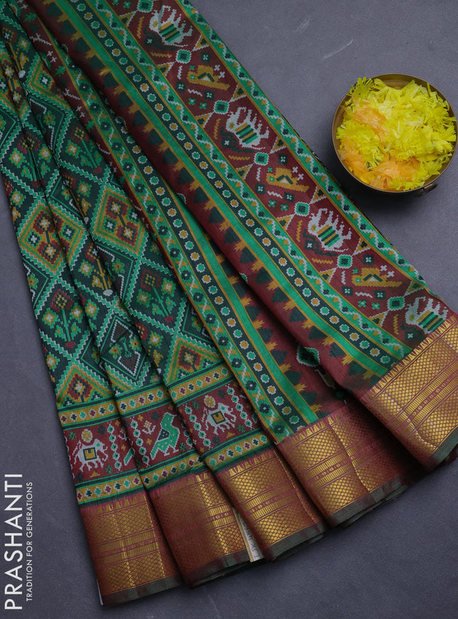 Semi tussar saree dark green and maroon with allover ikat prints and zari woven border