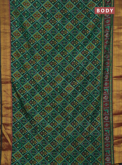 Semi tussar saree dark green and maroon with allover ikat prints and zari woven border