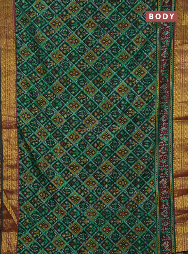Semi tussar saree dark green and maroon with allover ikat prints and zari woven border