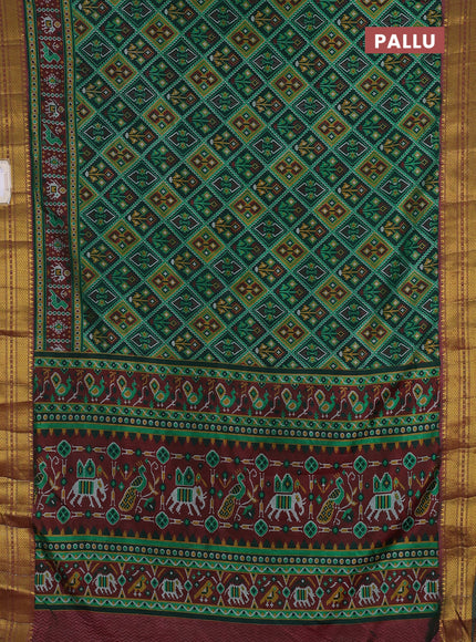Semi tussar saree dark green and maroon with allover ikat prints and zari woven border