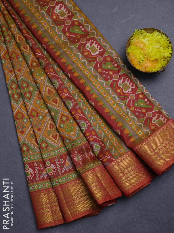 Semi tussar saree dark mustard and rust shade with allover ikat prints and zari woven border