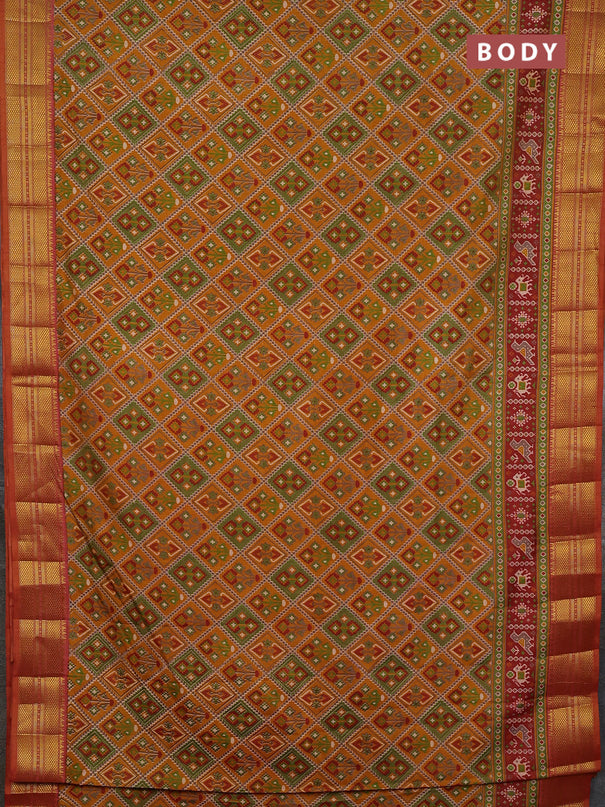 Semi tussar saree dark mustard and rust shade with allover ikat prints and zari woven border