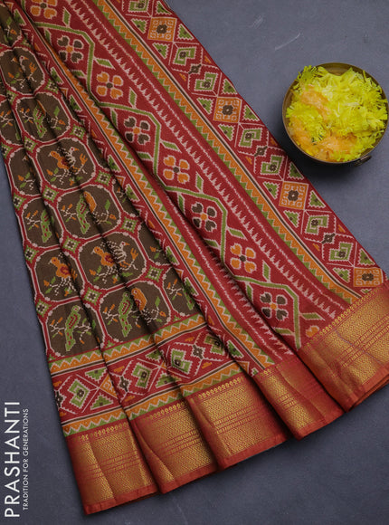 Semi tussar saree mehendi green and rust shade with allover ikat prints and zari woven border