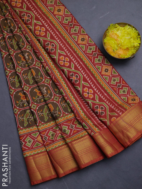 Semi tussar saree mehendi green and rust shade with allover ikat prints and zari woven border