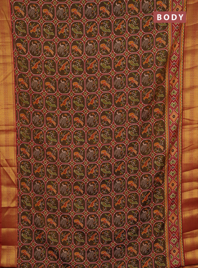 Semi tussar saree mehendi green and rust shade with allover ikat prints and zari woven border