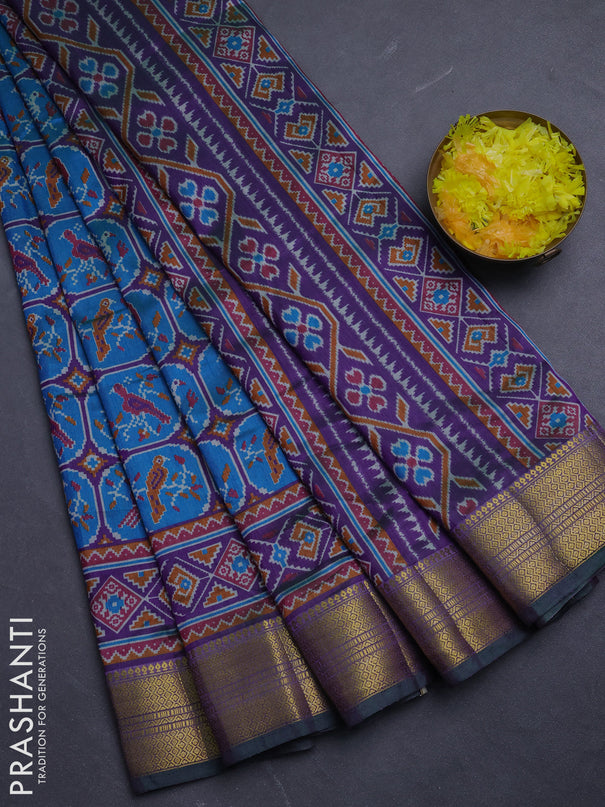 Semi tussar saree blue and purple with allover ikat prints and zari woven border