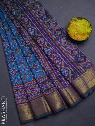 Semi tussar saree blue and purple with allover ikat prints and zari woven border
