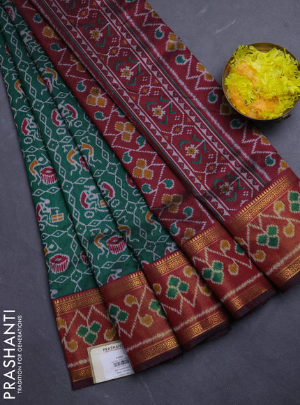 Semi tussar saree bottle green and maroon with allover ikat prints and ikat woven zari border