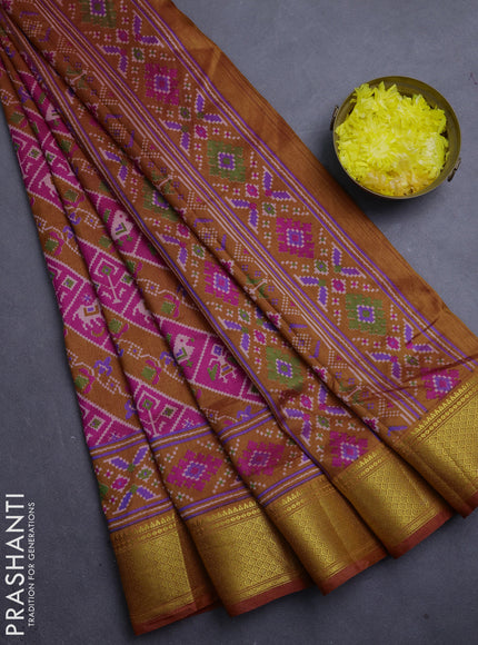 Semi tussar saree rust pink and rust shade with allover patola prints and zari woven border