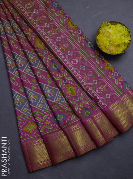 Semi tussar saree grey pink and orange with allover patola prints and zari woven border
