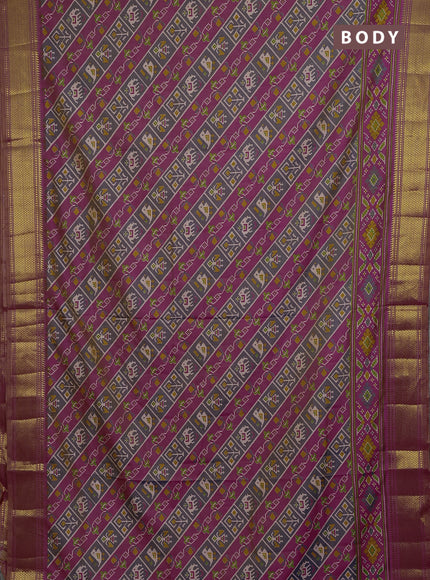 Semi tussar saree grey pink and orange with allover patola prints and zari woven border