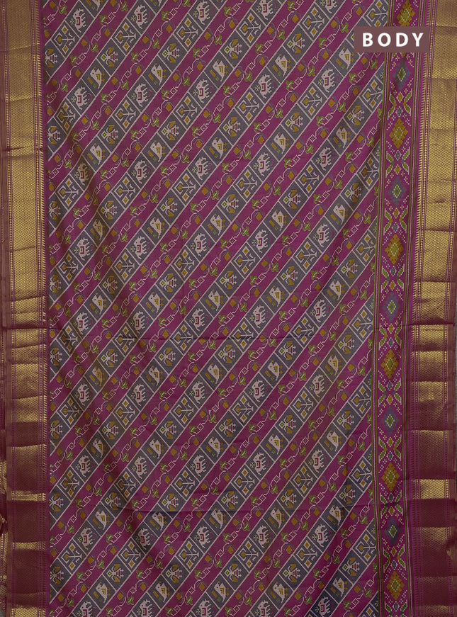 Semi tussar saree grey pink and orange with allover patola prints and zari woven border