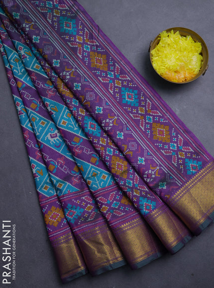 Semi tussar saree teal green and purple with allover patola prints and zari woven border