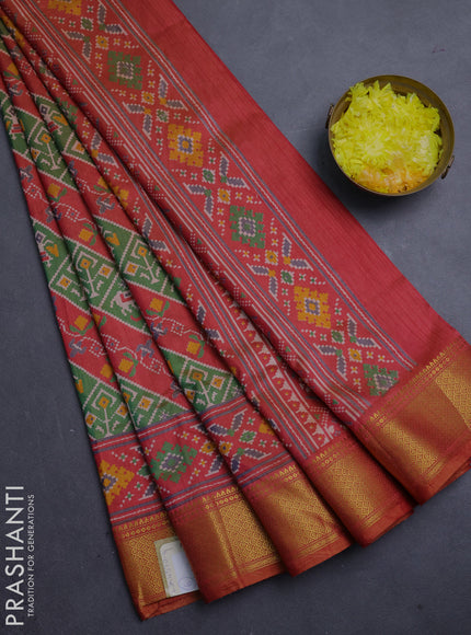 Semi tussar saree green and rust orange with allover patola prints and zari woven border
