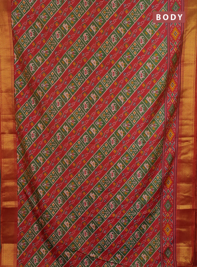 Semi tussar saree green and rust orange with allover patola prints and zari woven border