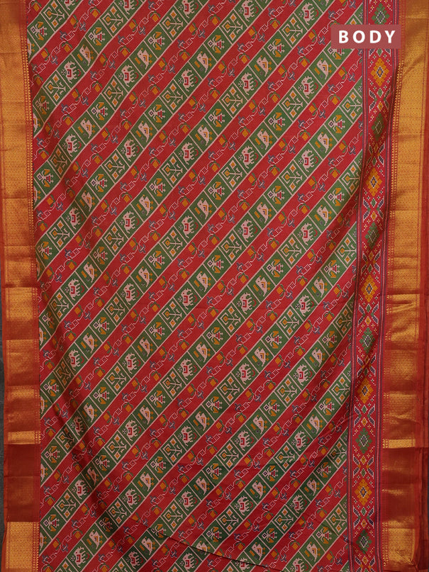 Semi tussar saree green and rust orange with allover patola prints and zari woven border