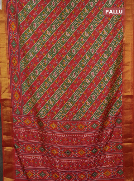 Semi tussar saree green and rust orange with allover patola prints and zari woven border