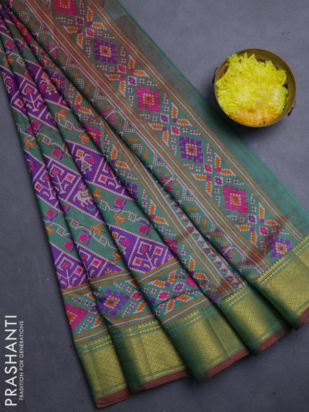 Semi tussar saree purple and green with allover patola prints and zari woven border